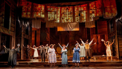 (L-R) Juwon Tyrel Perry, Sean Blake, Ariya Hawkins, Eric A. Lewis, Curtis Bannister, Lachrisa Grandberry, Aalon Daeja Smith, Reneisha Jenkins, Sharriese Hamilton, Nicole Michelle Haskins, Gilbert Domally, Jos N. Banks and Daryn Whitney Harrell in The Color Purple at Goodman Theatre.