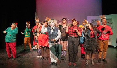 (left to right) Lori Lee, TJ O'Brien, David Cerda, Cameron Cai, Micah Mixon, Matt Sergot, Michael Radford, Sydney Genco, Kelly Bolton, Whitney Willard Wilkinson, Mark Bartishell and Shawn Quinlan in Hell in a Handbag Productions’ production of Rudolph the Red-Hosed Reindeer (An Unauthorized Musical Parody).