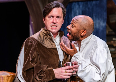 Jared Dennis (l) as actor John Heminges and James Lewis as Ben Johnson in "The Book of Will," playing at The Den Theatre through October 25, 2025.