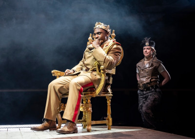 Elijah Jones as Henry V, with Kate Fry as the Earl of Westmoreland, in Shakespeare’s Henry V. Directed by artistic director Edward Hall and running in the Courtyard Theater September 6 - October 6, 2024.