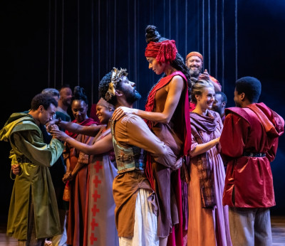 Zach Wyatt as Pericles, Leah Haile as Thaisa, and the company of the Royal Shakespeare Company’s Pericles. Directed by RSC co-artistic director Tamara Harvey and running in Chicago Shakespeare’s Courtyard Theater October 20-December 7, 2024.
