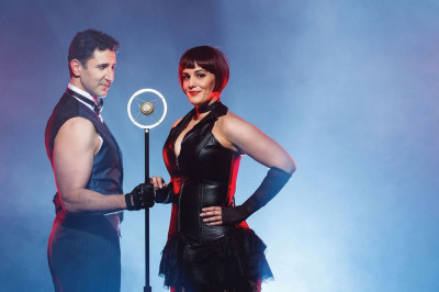 Sean Fortunato as Emcee and Danni Smith as Sally Bowles in Theatre at the Center's "Cabaret"