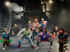 Bill Gordon (Bruce McClane) and Cast Opening number of Yippee Ki-Yay Merry Christmas