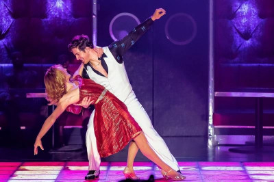Stephanie Mangano (Erica Stephan) and Tony Manero (Adrian Aguilar) in Saturday Night Fever the Musical at Drury Lane Theatre