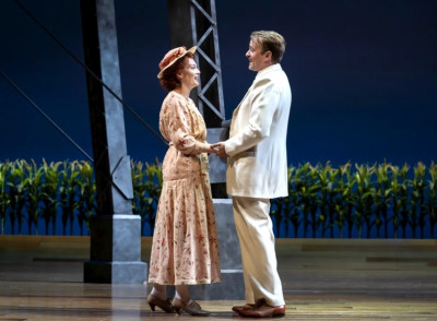 Under the water tower in The Music Man at Goodman Theatr: Monica West (Marian Paroo) and Geoff Packard (Harold Hill) .