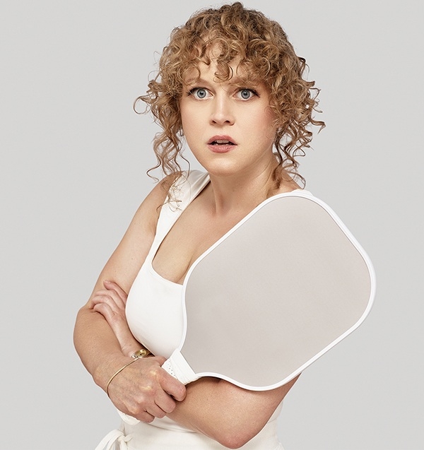 Pictured: ensemble member Caroline Neff in a publicity image for Steppenwolf Theatre Company's world premiere of "Adirondack Chair Circle."