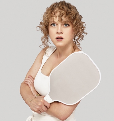 Pictured: ensemble member Caroline Neff in a publicity image for Steppenwolf Theatre Company's world premiere of "Adirondack Chair Circle."