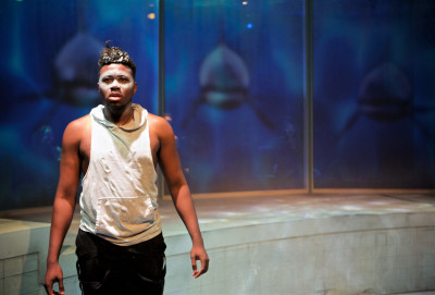 Gregory Geffrard in Sideshow Theatre's production of Tilikum at the Biograph Theatre.