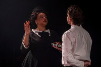 Mamie Bradley (NK Gutiérrez, left) is sworn in by clerk Charlie Cox (Mickey Dolan) in Collaboration Theatre’s new production of Trial in the Delta: The Murder of Emmett Till.