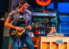 Billy Rude, guitar, and Frederick Harris, piano, in Porchlight Music Theatre’s Pump Boys &amp; Dinettes, now playing through Dec. 12, 2021 at The Ruth Page Center for the Arts, 1016 N. Dearborn.